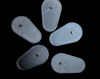 May include: Five gray plastic pieces shaped like a flower with a small hole in the center of each piece.