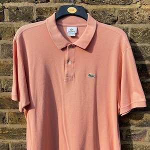 Lacoste salmon shop pink polo