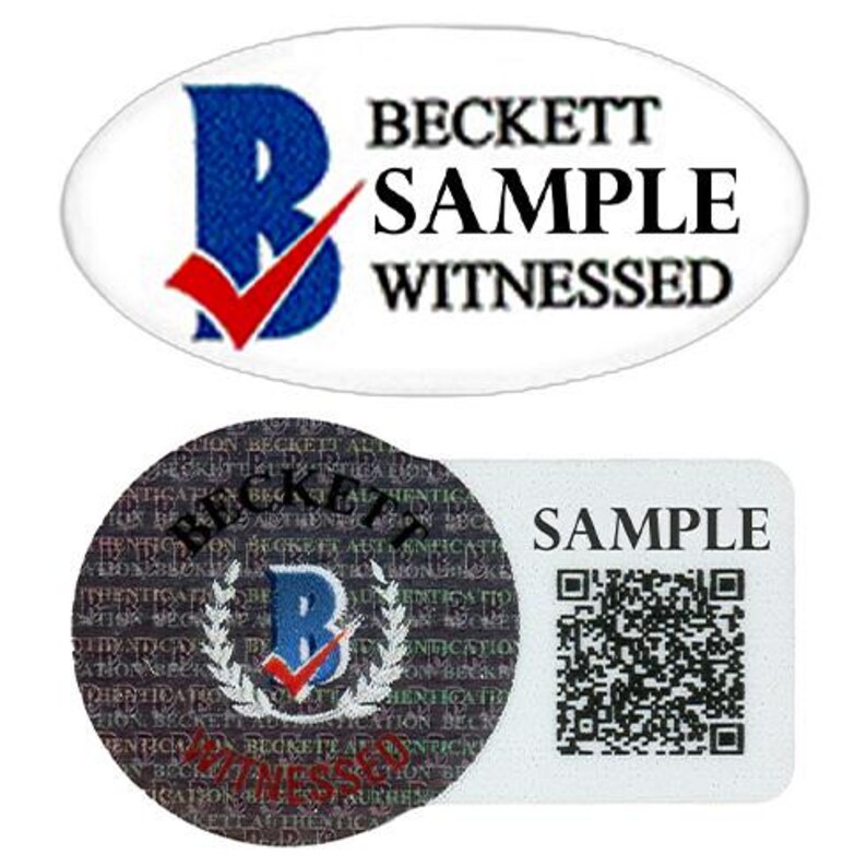 May include: An image featuring three stickers. The top sticker is an oval shape with the text "BECKETT SAMPLE WITNESSED". The second sticker is a circular shape with the text "BECKETT WITNESSED". The third sticker is a rectangle with the text "SAMPLE" and a QR code.