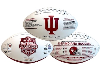 May include: Three white footballs featuring Indiana Hoosiers branding. One displays stadium and football history, another shows the 2025 National Champions logo, and the third lists the undefeated 2025 season game scores and results in crimson text.
