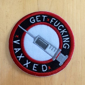 May include: A red, white, and black embroidered patch with the text "GET F*CKING VAXED" and a stylized image of a syringe.