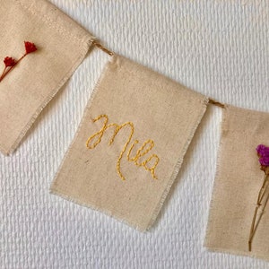 Flags with dried flowers on cotton, cotton/linen/polyester cloth
