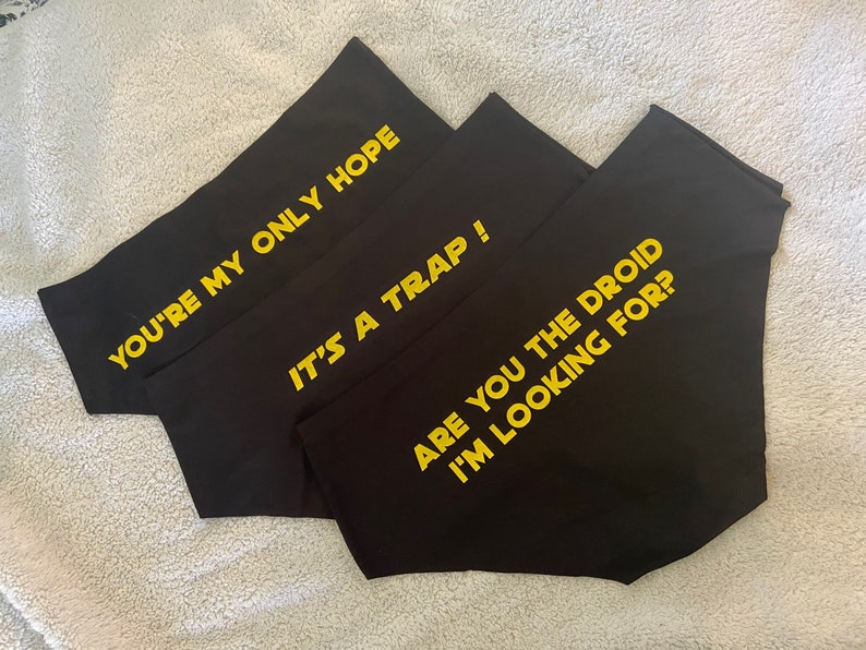 May include: Three black underwear with yellow text. The text reads "You're my only hope", "It's a trap!" and "Are you the droid I'm looking for?"