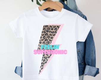 Oasis inspiré Supersonic T Shirt enfant en bas âge bébé enfants vêtements musique cadeau Rock imprimé léopard Indie Alternative Skater Style T-Shirt unisexe