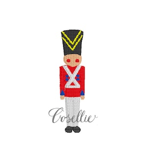 May include: A red and white toy soldier with a black hat and yellow trim. The soldier has a blue sash and white pants.