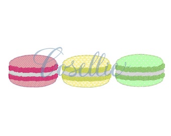 May include: Three macarons, one pink, one yellow, and one green, with white filling. Each macaron has a different pattern.