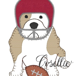 May include: A white dog wearing a red and gray football helmet and holding a brown football. The dog is sitting on a white background. The text "Croslie" is written below the dog.