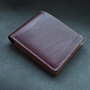 Cartera plegable burdeos / Piel buttero plena flor