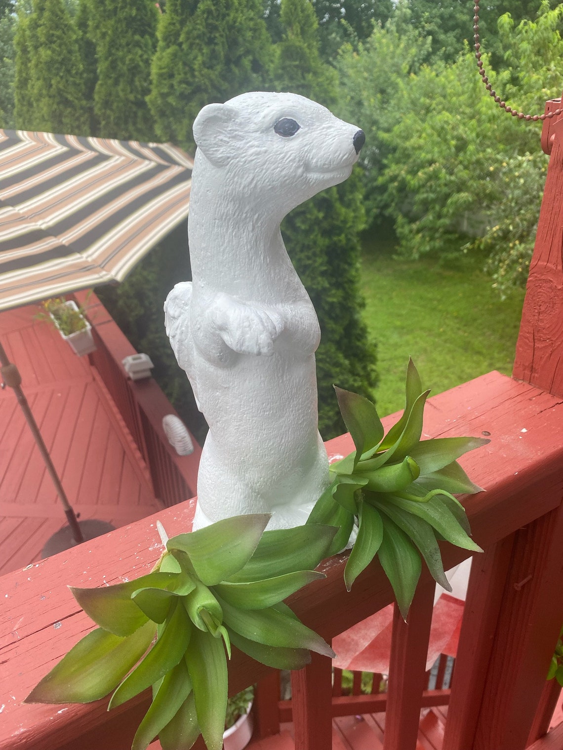 Ferret with wings concrete statue | Etsy