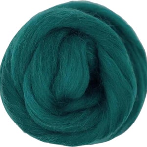 May include: A ball of teal blue wool roving, a type of fiber used for felting and spinning.