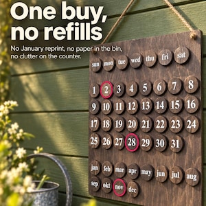 May include: A rectangular wooden perpetual calendar with a jute rope hanger. It features circular wooden discs with white printed days of the week, numbers 1 through 31, and months from January to December. Three discs are highlighted with red rings.