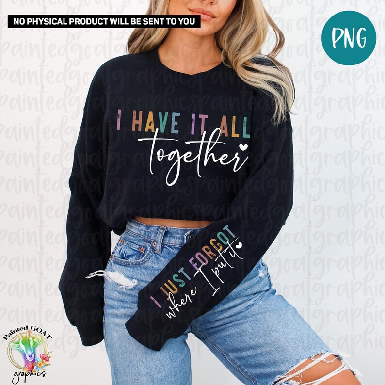 May include: A black sweatshirt with the text "I HAVE IT ALL together" in rainbow colors on the front and "I JUST FORGOT where I put it" in rainbow colors on the sleeve.