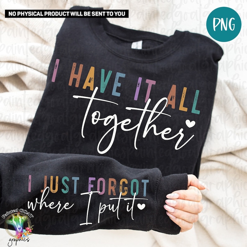 May include: Black sweatshirt with the text "I have it all together" in rainbow colors and a small heart. The sleeve of the sweatshirt has the text "I just forgot where I put it" in rainbow colors and a small heart.