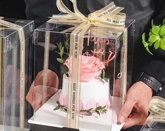 Caja de regalo transparente para pastel de 8,5" con cinta, ideal como regalo de fiesta.