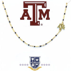 The Texas A&M University Necklace: Side Set Aggies Logo on Maroon Enamel Bead Necklace. Gig Em!