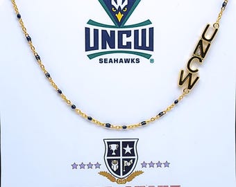 The University of North Carolina-Wilmington Necklace: Side Set University of North Carolina-Wilmington Logo on Enamel Bead Necklace.