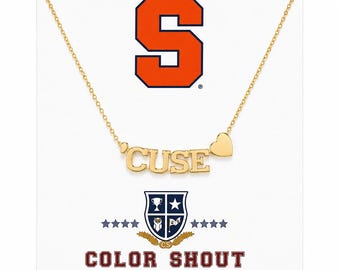 May include: A gold-toned necklace featuring the word CUSE in block letters and a small heart charm. The display card shows a large orange block letter S, a shield emblem with stars and an owl, and the text COLOR SHOUT in red block letters.
