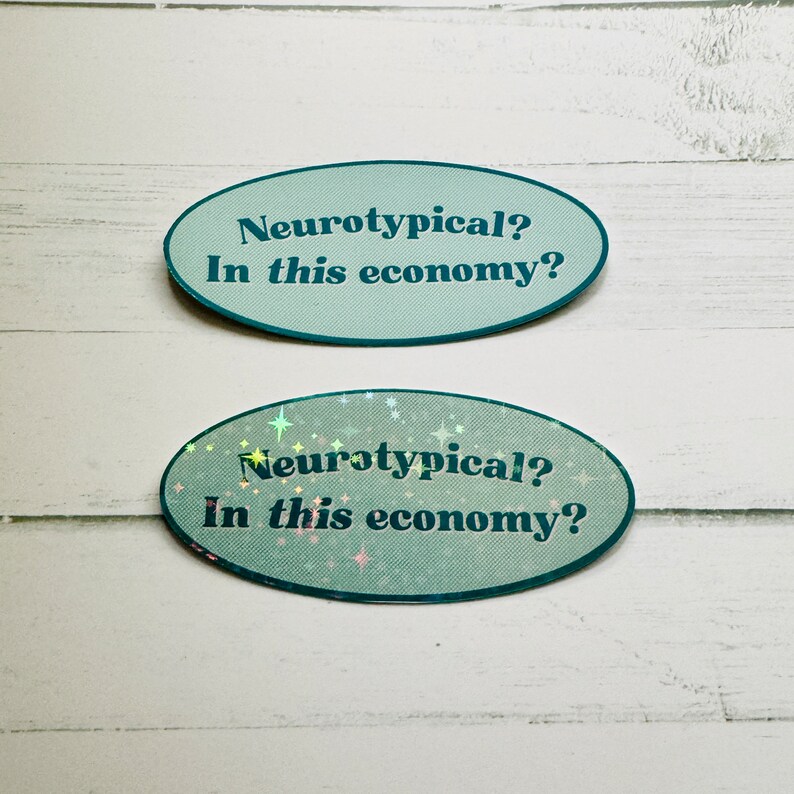 May include: Two oval stickers with a teal background and white text that reads "Neurotypical? In this economy?" The bottom sticker has a holographic finish with iridescent stars.