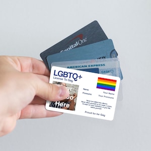 License To Gay aluminium wallet card personalised with the classic gay pride flag, your name, pronouns, and photo