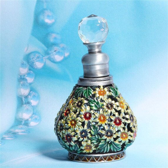 empty daisy perfume bottle