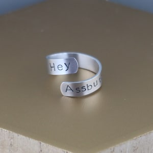 Supernatural Castiel Inspired Metal Stamped Wrap Ring - Hey Assbutt - Handmade - Hand Stamped - Aluminum - Silver