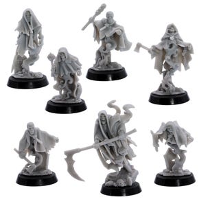 May include: A collection of seven gray miniature figurines of skeletal figures, each with a unique pose and weapon. Some figures wear hooded cloaks and stand on black circular bases. The weapons include a scythe, axe, and staff.