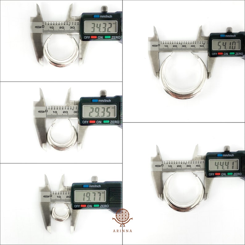 May include: Close-up of a silver hoop earring being measured with a digital caliper. The caliper reads 34.327 mm, 29.357 mm, 19.777 mm, 54.10 mm, and 44.41 mm.
