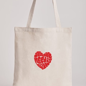 Embroidered jute tote bag