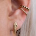 see more listings in the Earring section