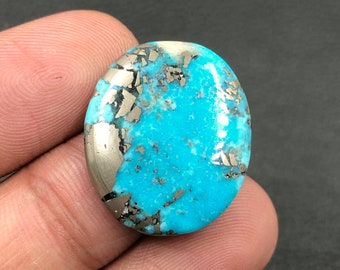 Cabochon Morenci turquoise... Cabochon ovale... 24x20x4 mm... 18 Cts...A#M6225