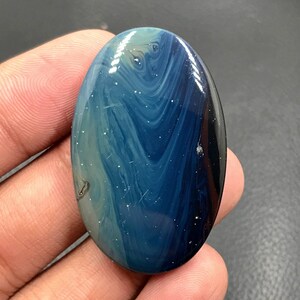 Leland Blue Cabochon...Oval Cabochon...42x27x6 mm...61 Cts...A#L3313