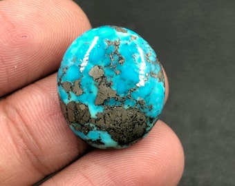 Cabochon Morenci turquoise... Cabochon ovale... 21x18x5 mm... 18 Cts...A#M6235