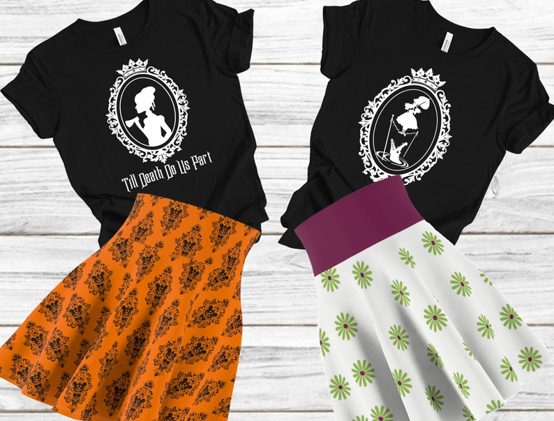 May include: Two black t-shirts with white graphic designs of a woman in a frame. The text on one shirt reads "Till Death Do Us Part". One t-shirt is paired with an orange skirt with a black pattern, and the other is paired with a white skirt with a green floral pattern.