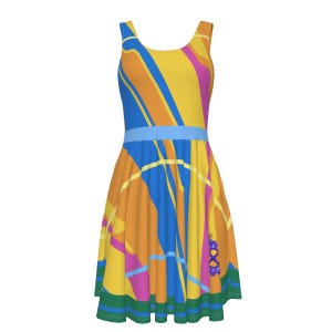 May include: A sleeveless yellow, orange, blue, and pink dress with a geometric pattern. The dress has a blue sash at the waist and a green and blue trim at the hem.