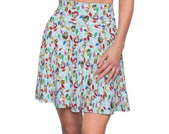 May include: A light blue skirt with a pattern of Mickey Mouse and friends wearing Santa hats and Christmas lights.