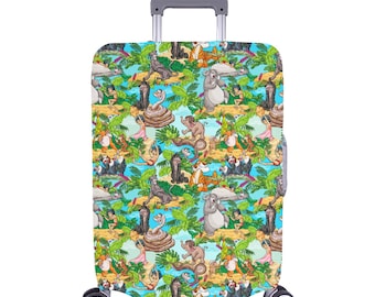 May include: A blue luggage cover featuring a repeating pattern of characters from The Jungle Book. The characters include Baloo, King Louie, Shere Khan, and Kaa. The background is a light blue with green palm trees and vines.