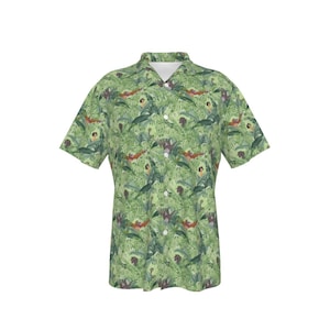 May include: A green short-sleeved button-down shirt with a jungle print featuring various animals and plants.