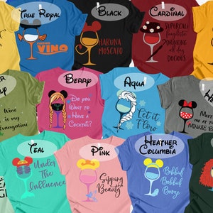 May include: A collection of 16 t-shirts featuring various Disney characters and wine glasses. The shirts are in different colours, including yellow, blue, red, green, pink, teal, mint, and forest green. Each shirt has a unique design with a Disney character and a wine glass with a punny saying. The sayings include "Drunkest of them all", "Finding Vino", "Hakuna Moscato", "Supercalifingilistic Drinking all day Docious", "Beauty and the Bottle", "Wine is my Evangatine", "Do you want to have a cocktail?", "Let it Flow", "Meet me at the Minnie Bar", "Under the Influence", "Sipping Beauty", "Bobbil Bobbul Booze", and "Chase the Wine and Touch the Sky".