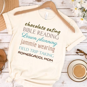 Chocolate Eating Bible Reading Lesson Planning Jammie Wearing Field Trip Taking Homeschool Mom Shirt