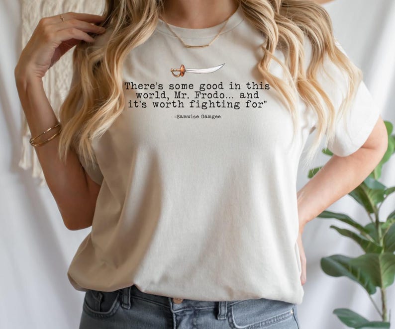 May include: A white t-shirt with a quote from the Lord of the Rings: "There's some good in this world, Mr. Frodo... and it's worth fighting for" -Samwise Gamgee