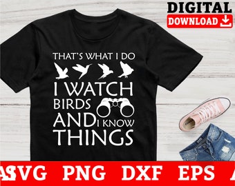 May include: Black t-shirt with white text that reads "That's what I do I watch birds and I know things". The text is surrounded by images of birds and binoculars.
