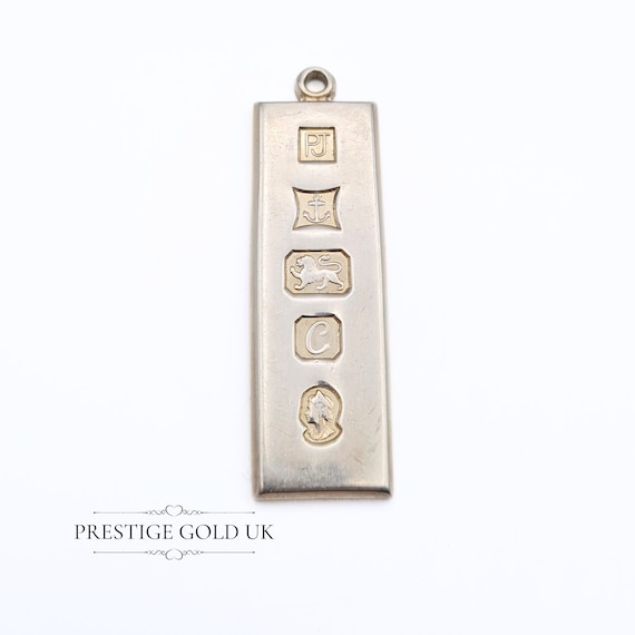 Silver ingot shop pendant 1977