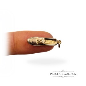 Top view of the 9ct gold hollow loafer charm, highlighting the realistic moccasin-style design and lightweight construction.