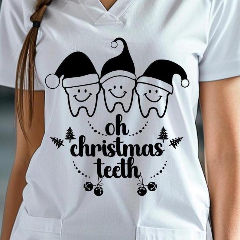 May include: White scrub top with a graphic of three smiling teeth wearing black Santa hats. The text "oh christmas teeth" is below the teeth, with Christmas tree and ornament accents.