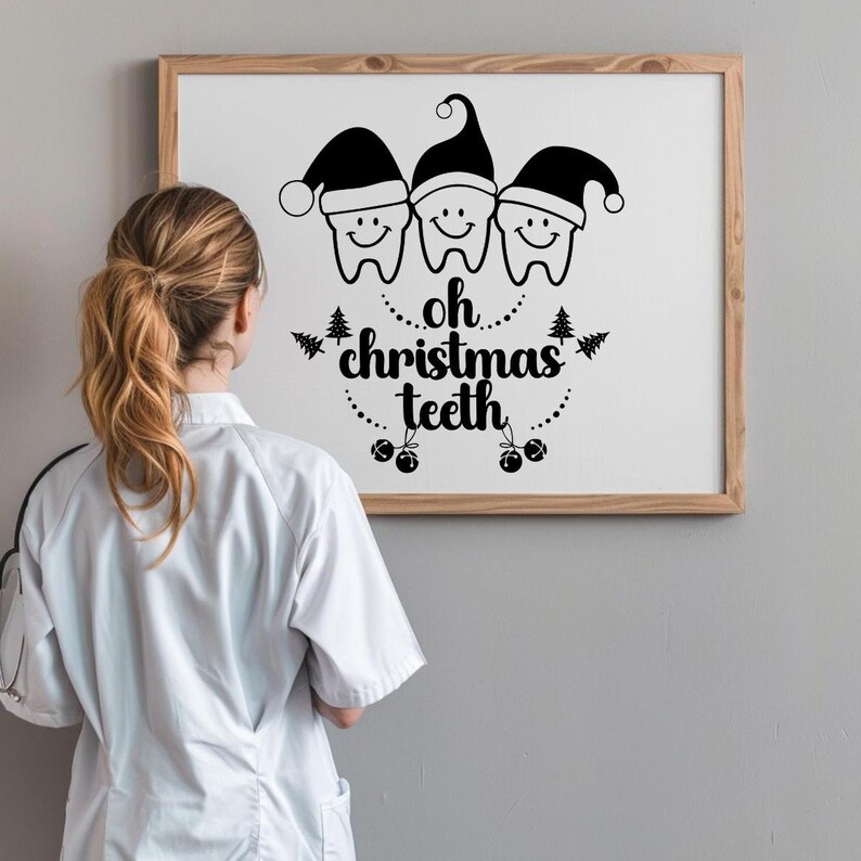 May include: A framed print featuring three smiling teeth wearing Santa hats. The text "oh christmas teeth" is written below the teeth in a decorative font, with Christmas tree and ornament accents. The print is displayed on a wall.