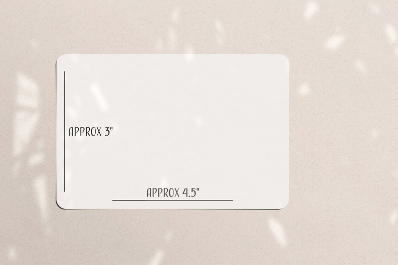 May include: A white rectangular card with rounded corners. The card's dimensions are approximately 3 inches by 4.5 inches. The text "APPROX 3" and "APPROX 4.5" are printed on the card.