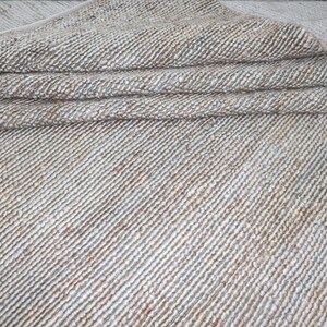 Handmade Jute Rug: Contemporary Woven Wool & Cotton Rug