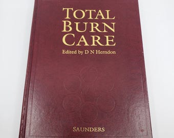 2000 Edition of Total Burn Care Reference Hardcover Book by Saunders. Shriners Burn Institute at UTMB Galveston.  Like New