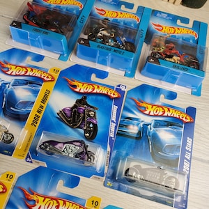 Vintage Hot Wheels Motorcycle Die Cast Lot of 9 Vehicles Unopened on Original Cards.