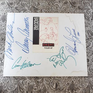 Ann & Nancy Wilson Heart Autographs with Backstage Pass.